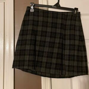 Plaid mini with kick pleats